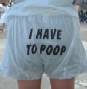 1998 Ford Crown Victoria - Pair of white shorts with a humorous message printed on the back.