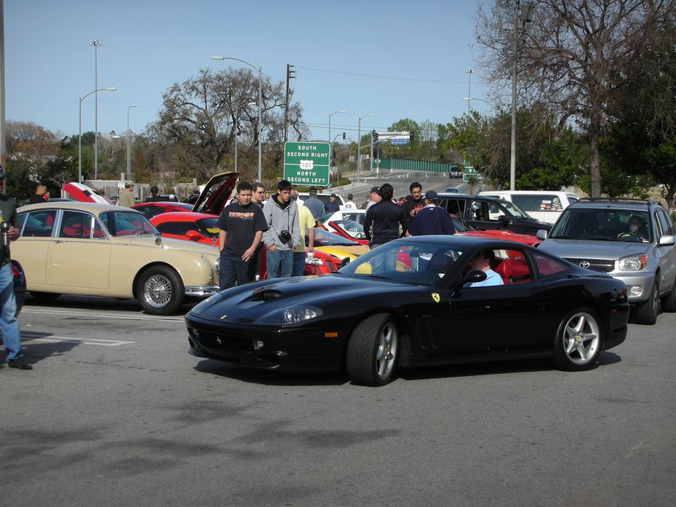 Black Ferrari 550 Maranello coupe parked at car show
