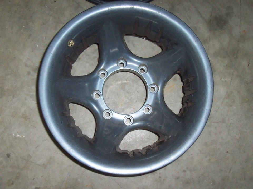 Gray alloy wheel with five spokes and a 10-lug bolt pattern