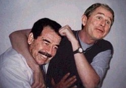 1998 Ford Crown Victoria - A photograph shows Saddam Hussein and George W. Bush in a close pose.