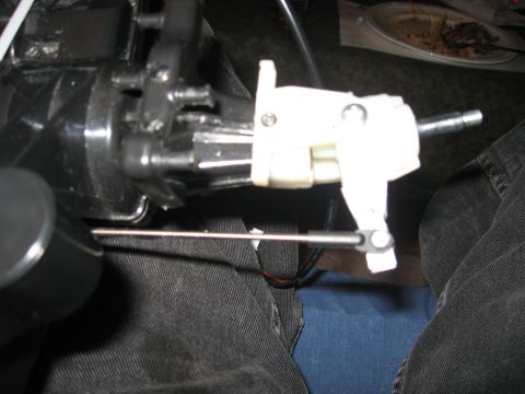 1990 Ford Bronco - Detail of an interior car mechanism, possibly related to a door or seat adjustment.