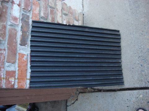 1983 Ford Bronco - i wanted to have a way to get the dirt out from under the tank. i had this chunk of bed liner on the side yard. this will add 1-1 1/2"s to…
