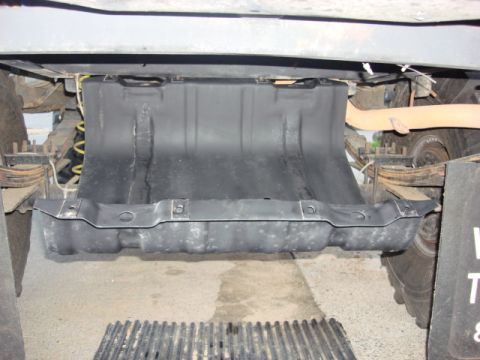 1983 Ford Bronco - now it is all going back together, i put 2 bolts on the back side of the gas tank to hold the skid plate.