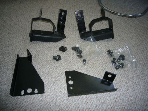 2000 Ford Crown Victoria - Set of vehicle mounting brackets and hardware, possibly for aftermarket accessories.