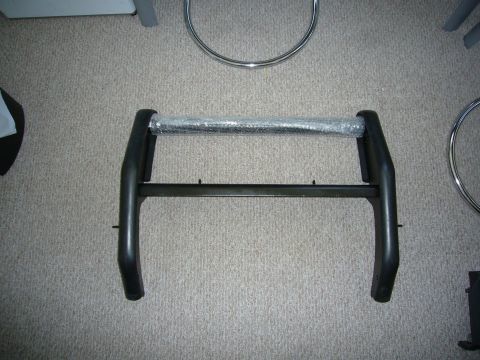 2000 Ford Crown Victoria - Bull bar part, likely for a truck or SUV, shown on a carpeted surface.