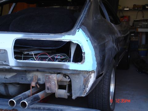 1978 Ford Mustang II - First coat of regular filler after a partial build up of fiberglas reinforced filler was applied. View 1
