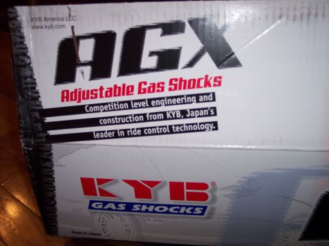 2003 Ford Focus - Box for KYB AGX Adjustable Gas Shocks, detailing their features and manufacturer information.