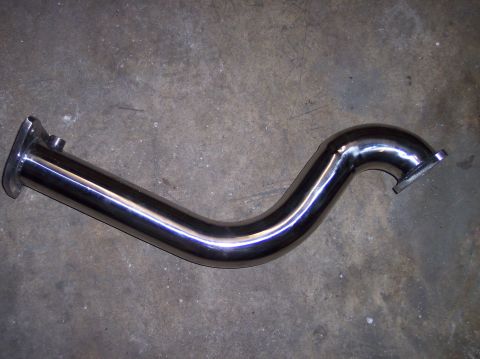 2003 Ford Focus - A polished exhaust pipe is shown lying on a concrete surface.