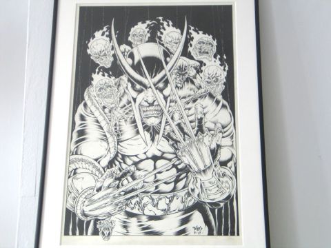 1991 Ford Bronco - This framed artwork depicts Wolverine surrounded by flaming skulls, with his signature claws extended.