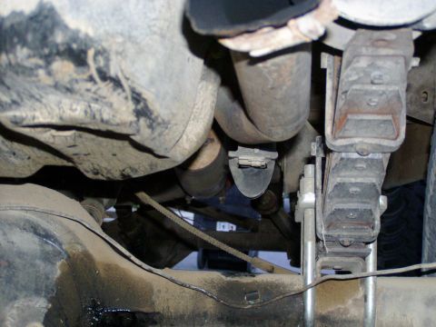 1967 Ford Bronco - Close-up of the undercarriage reveals suspension components and exhaust system details.