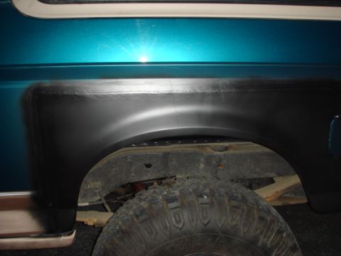 1996 Ford Bronco - Repair work on the rear quarter panel of a 1996 Ford Bronco.