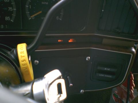 1989 Ford Bronco - Close-up of a vehicle's dashboard, showing gauges and control indicators.
