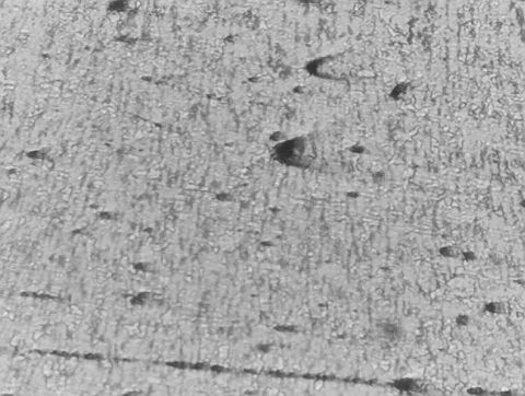 1980 Ford F-250 - This image shows the microscopic grain structure of metal, likely from a component of a vehicle.