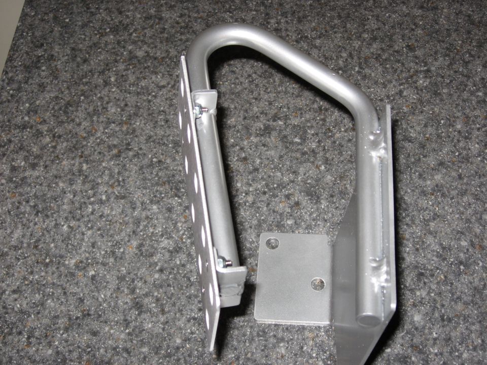 Welded tubular metal bracket assembly on a countertop