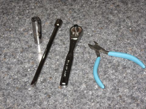 2001 Ford Crown Victoria - Tools necessary: 10mm socket, socket extension, ratchet, small cutting tool.