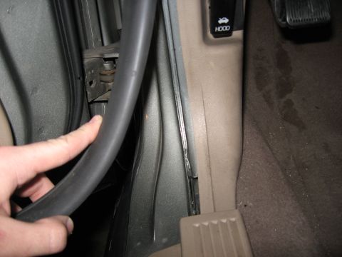 2001 Ford Crown Victoria - Step 1: Pull weatherstripping back a few inches.