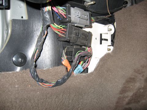 2001 Ford Crown Victoria - Step 3: Pull carpet back. Before.