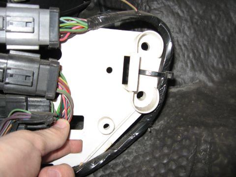 2001 Ford Crown Victoria - Step 5: Cut white bracket (before).