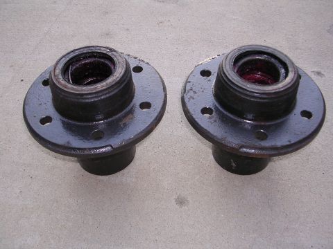 1999 Toyota Tacoma - A pair of wheel hubs, likely for a truck or SUV, are shown on a concrete floor.