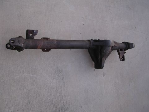 1999 Toyota Tacoma - Axle housing for a Toyota vehicle, likely a truck or SUV, shown on a concrete surface.