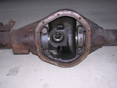 1999 Toyota Tacoma - Close-up of a rusty differential housing, showing internal components and stamped part numbers.