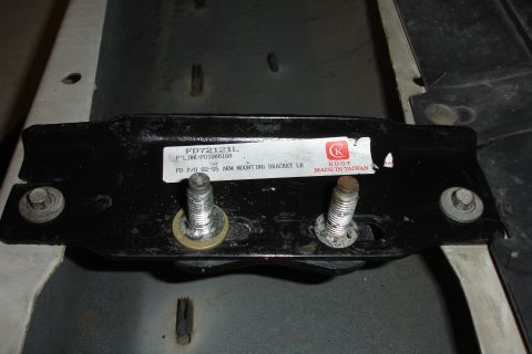 1996 Ford Bronco - A black metal bracket with a label indicating it is for a 1992-1995 Ford pickup truck.