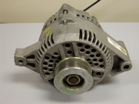 1989 Ford Bronco - This is an automotive alternator, a key component for charging a vehicle's battery.