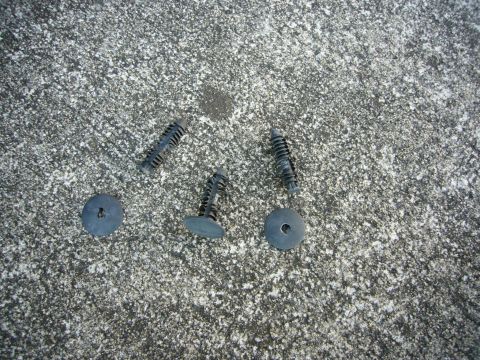 2000 Ford Crown Victoria - These are plastic automotive clips and washers, likely for interior trim or body panel attachment.