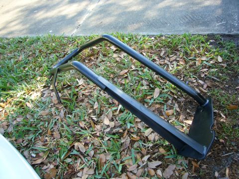 2000 Ford Crown Victoria - Go Rhino push bumper part shown on the ground.