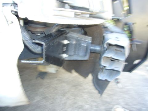 2000 Ford Crown Victoria - A black metal push bumper bracket is mounted to the front of a white vehicle.