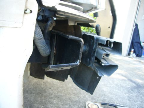 2000 Ford Crown Victoria - Close-up of a Go Rhino push bumper mounting bracket on a vehicle.
