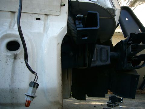 2000 Ford Crown Victoria - This image shows a close-up of a vehicle's front end, focusing on the frame and a bumper mounting bracket.