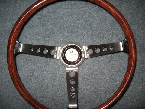 1968 Shelby GT500 - This steering wheel features the iconic Shelby Cobra logo, matching the 1968 Shelby GT500 claim.