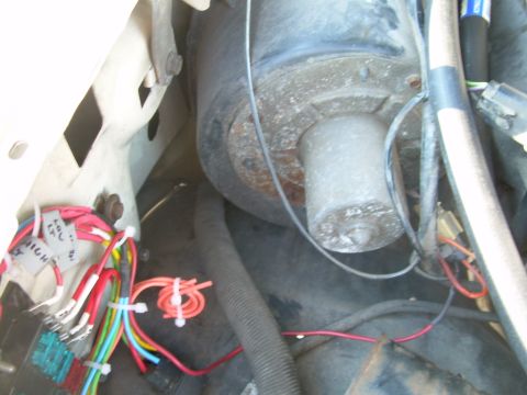 1988 Ford Bronco - Close-up of a blower motor and its associated wiring harness, with labels on some wires.
