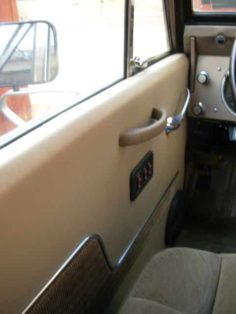 1975 Ford Bronco - I found a grab handle that we both liked, and it's on.