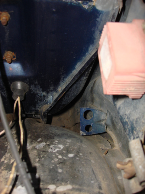1983 Ford Bronco - this is the motor side of the firewall where the EEC and harness will go. you can see the high alt harness on the middle left.