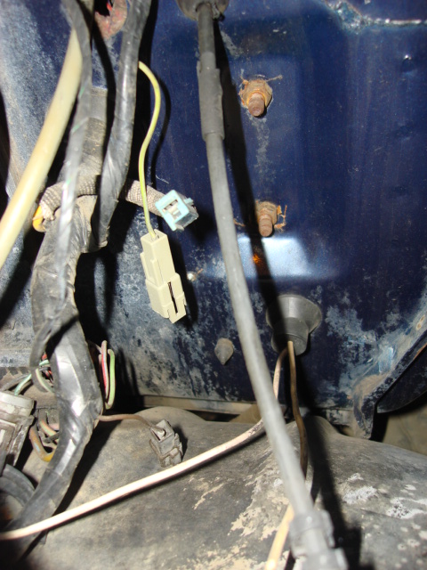 1983 Ford Bronco - the 2 rusty nuts are the ebrake mount to the right of this is where the EEC will go.