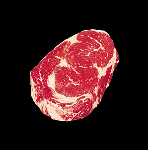 1991 Ford Bronco - A raw ribeye steak is shown against a black background with a website URL at the bottom.