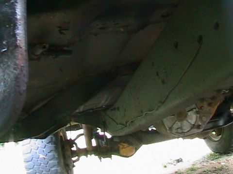 1977 Ford F-250 - Underside view of a 1977 Ford F-250, highlighting the frame and suspension components.