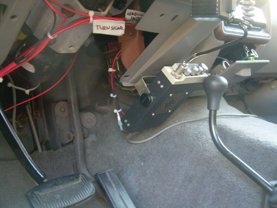 Interior wiring and CB radio with labels for 'Turn Signal' and 'Headlight Switch'