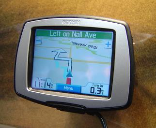 1991 Ford Probe - Garmin GPS unit displays navigation instructions and map details.