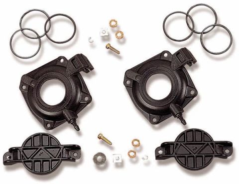 1972 Ford Ranchero - Carburetor base plates and associated gaskets and hardware are laid out on a white background.