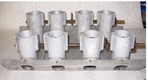 1972 Ford Ranchero - Dual quad intake manifold with eight individual runners, likely for a V8 engine.