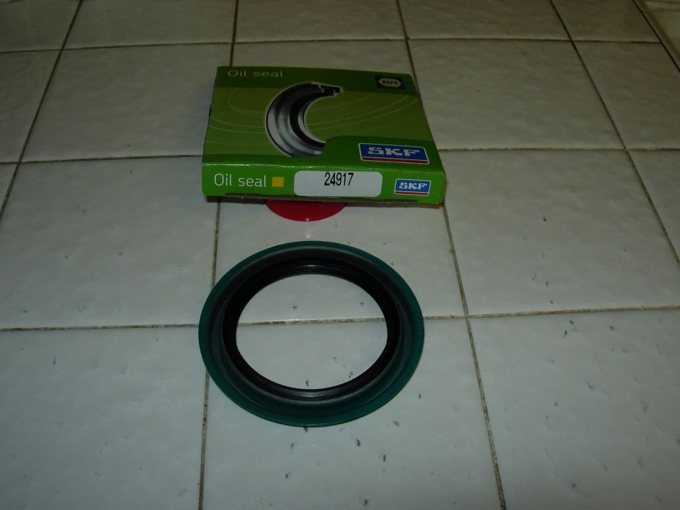 SKF oil seal part 24917 with green outer edge and black inner seal