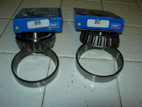 1990 Ford Bronco - Two sets of SKF wheel bearings, labeled BR35 and BR37, are displayed with their original packaging.