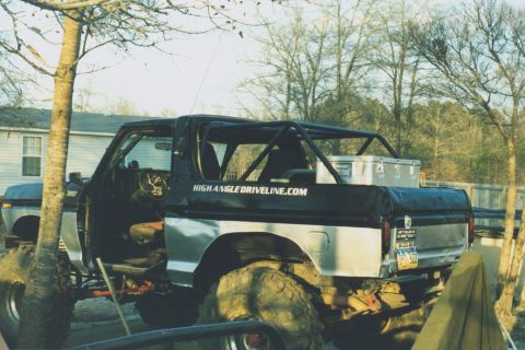1978 Ford Bronco - This modified SUV features a prominent roll cage and oversized tires, suggesting off-road use.