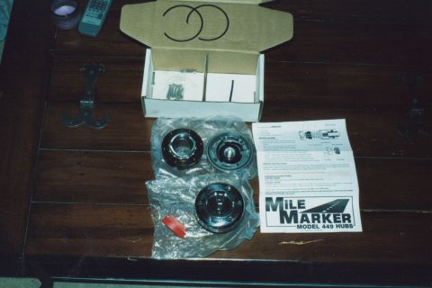1978 Ford Bronco - Unboxed Mile Marker Model 449 hubs and associated hardware with instructions.