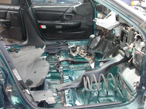 1993 Ford Taurus - Interior view of a 1993 Ford Taurus with extensive disassembly.