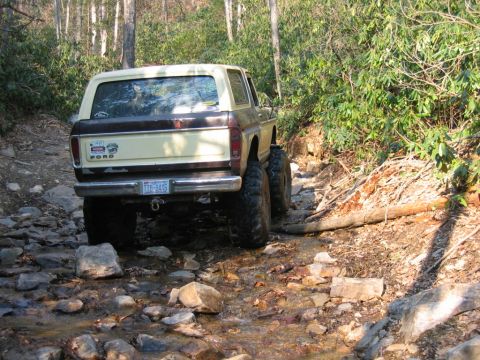 1992 Ford Mustang - This lifted 1978 Ford Bronco navigates a rocky stream during an off-road excursion.