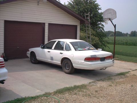 1995 Ford Crown Victoria - drivers side was almost perfect, but since i removed the trim i had to do some hole filling.